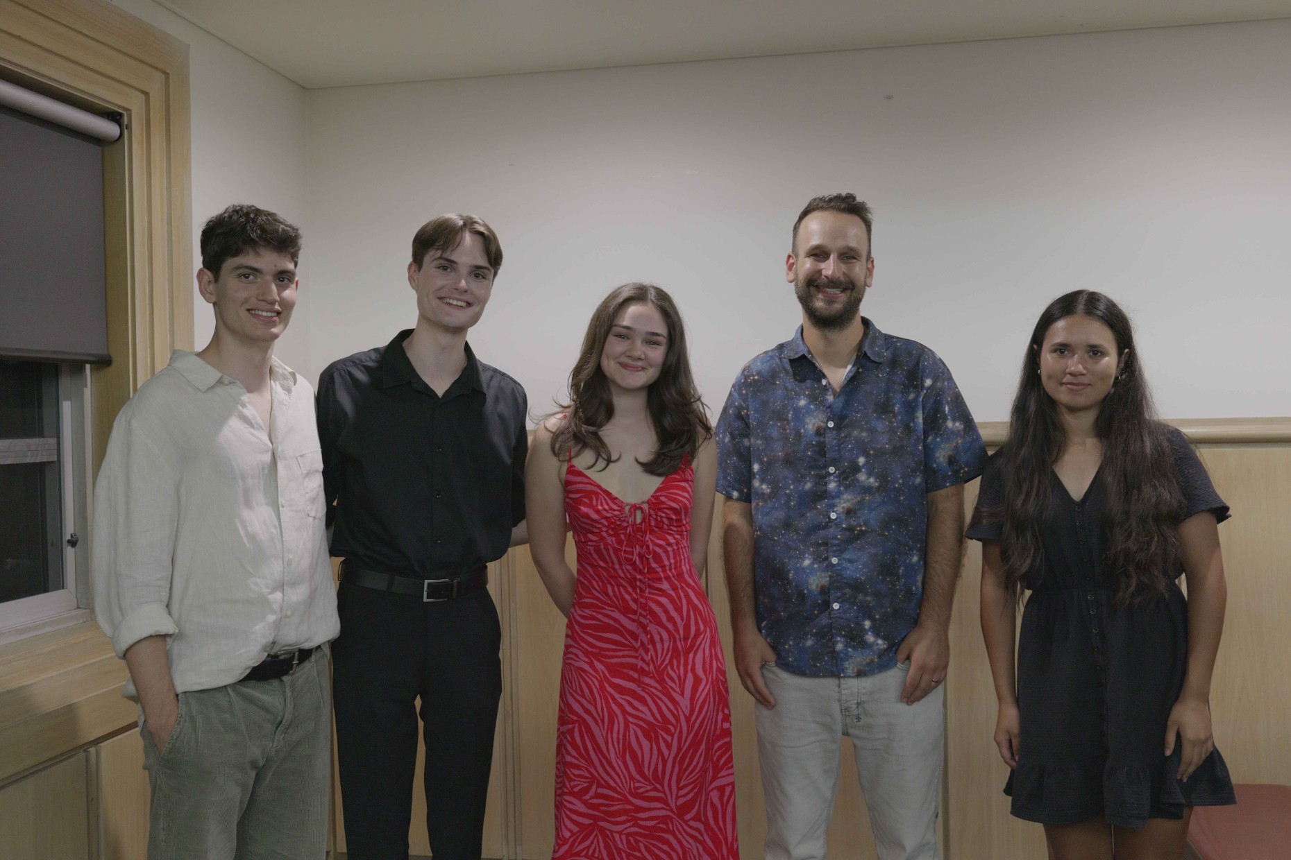 Kovi with residents at Mandelbaum House following his astronomy talk